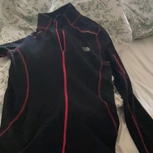 Black Jacket with Red Trim The North Face . Thin fleecy beautiful stitch detail